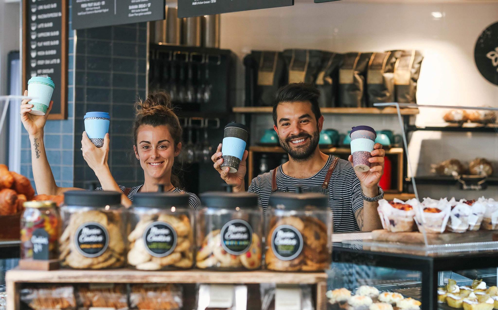 Happy Baristas with Coffee cups and cuff in Noosa Queensland