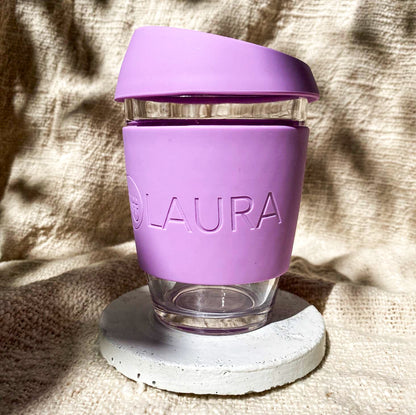 Purple reusable glass and personalised cuff with coffee order