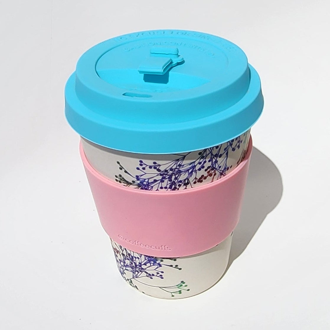 12oz_Bamboo_Keep_Cup_Floral_top_angle with lid
