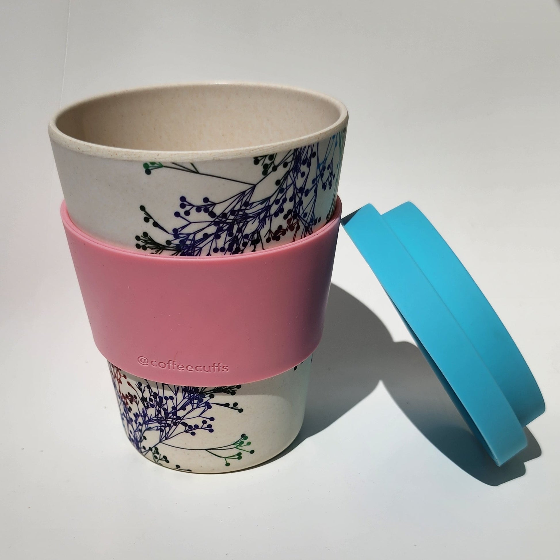 Bamboo_cup_ floral_Light blue lid_pink cuff_top angle
