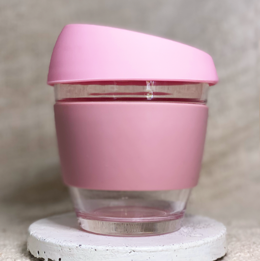 Pink and dusty pink reusable glass coffee cup with personal order details