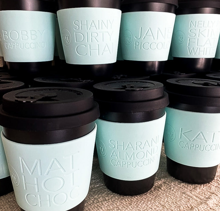 Reusable black bamboo cup and personalised sleeve