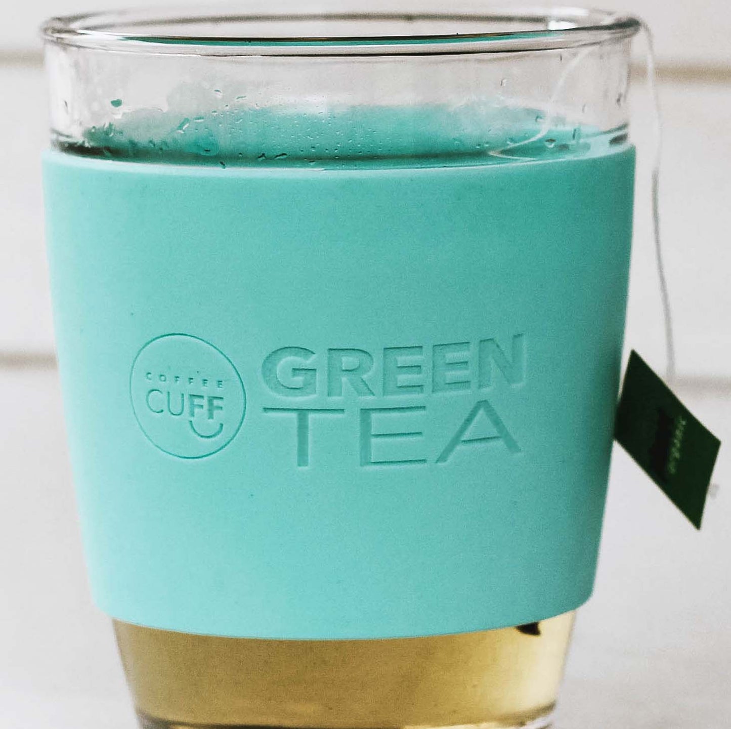 green_tea reusable keep cup on mint green glass for tea gift